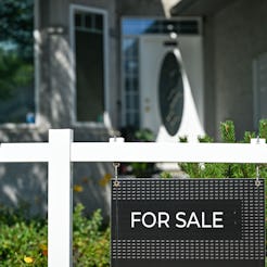 EDMONTON, CANADA - JULY 30:
A For Sale sign outside a downtown Edmonton home in Edmonton, Alberta, ...