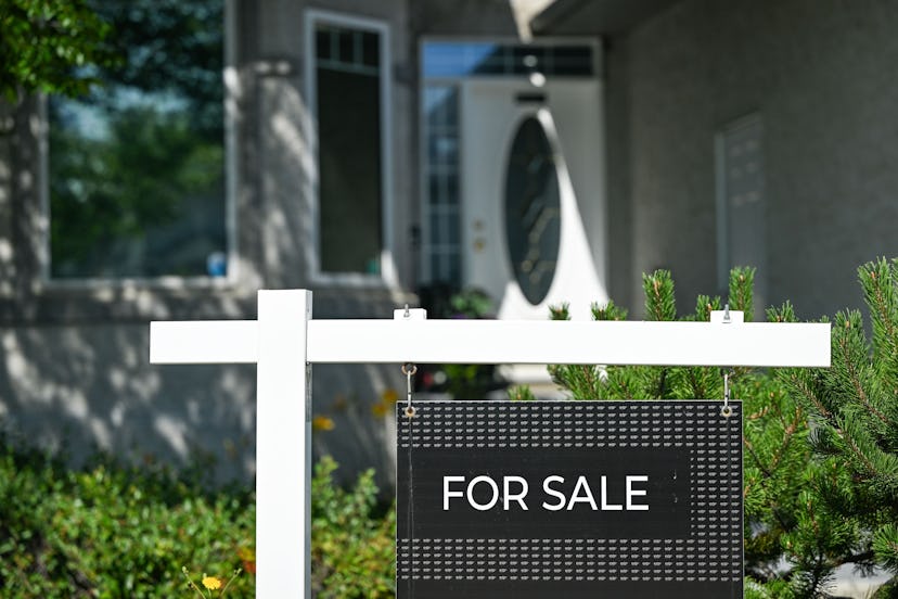 EDMONTON, CANADA - JULY 30:
A For Sale sign outside a downtown Edmonton home in Edmonton, Alberta, ...