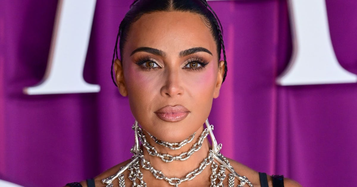 Kim Kardashian Wore A Plunging Corset & Y2K Headband On Khloé's Podcast