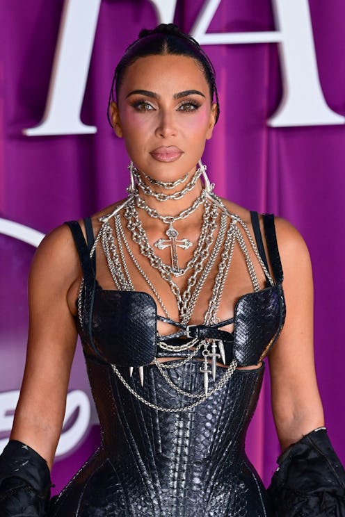 Kim Kim Kardashian wore a plunging corset and Y2K headband on the 'Khloé in Wonder Land' podcast.