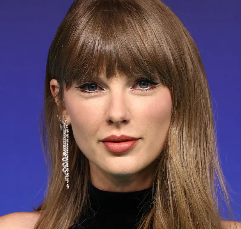 Taylor Swift wearing Tamara Ralph FW26 Couture, Leviev earrings, and Etho Maria and Forever Diamonds...