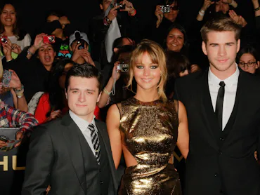 Josh Hutcherson, Jennifer Lawrence and Liam Hemsworth at the Premiere of Lionsgate's "The Hunger Gam...