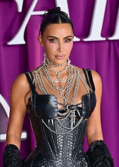 Kim Kardashian wore nothing but a plunging bra and undies in a Skims ad.