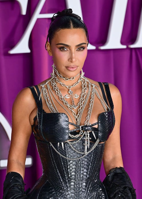 Kim Kardashian wore nothing but a plunging bra and undies in a Skims ad.