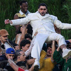 Bad Bunny performs in the Halftime Show of the Super Bowl LX between the New England Patriots and th...