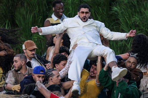 Bad Bunny performs in the Halftime Show of the Super Bowl LX between the New England Patriots and th...