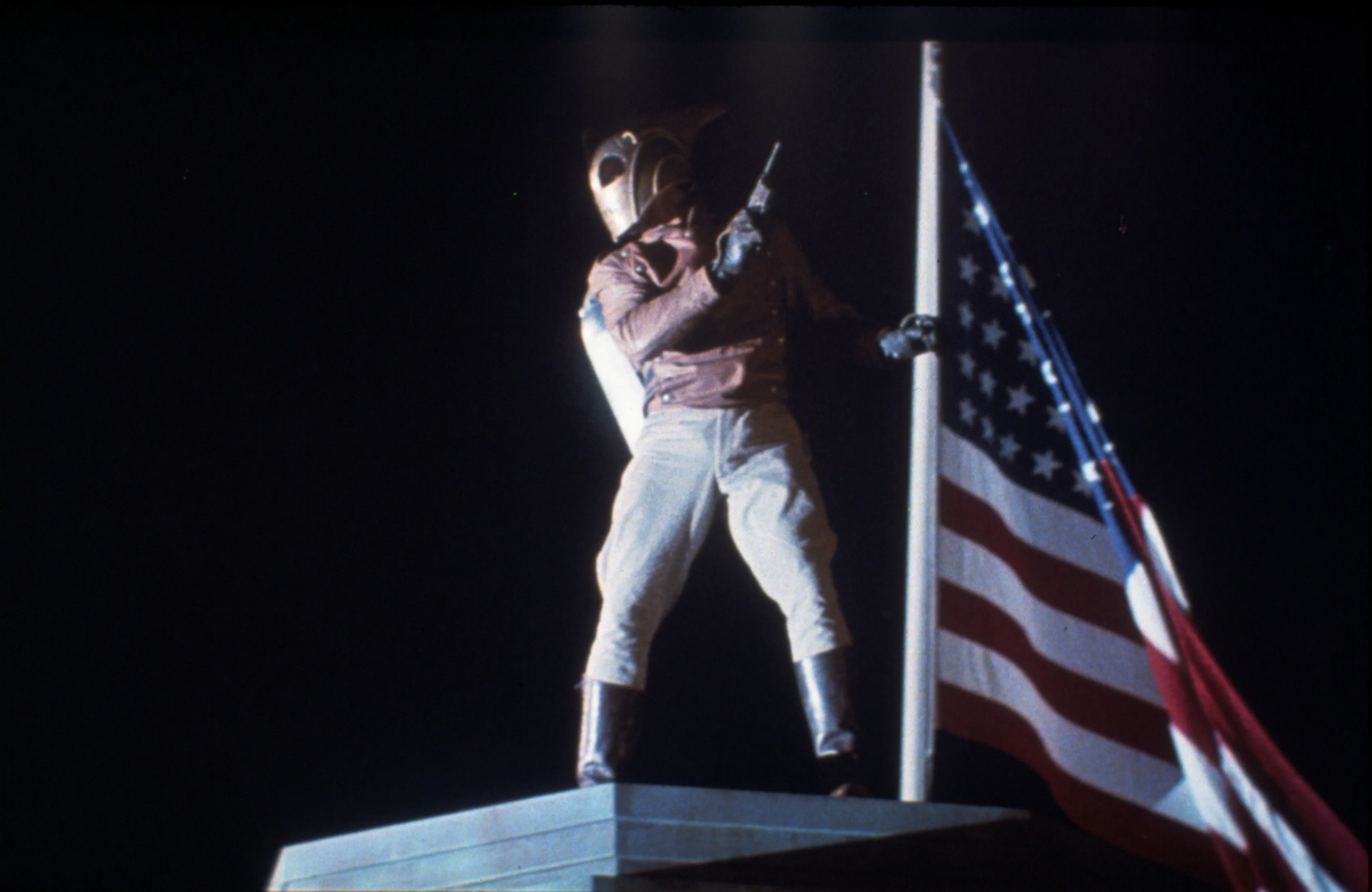 FILM STILLS OF 'ROCKETEER' WITH 1991, ACCESSORIES, AMERICAN FLAG, WILLIAM CAMPBELL, GUN CRAZY, HAND ...