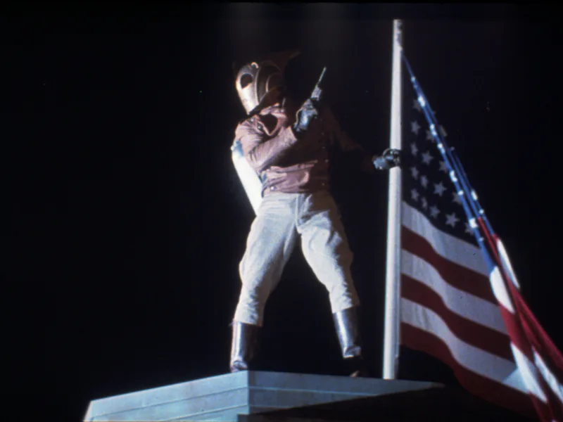 FILM STILLS OF 'ROCKETEER' WITH 1991, ACCESSORIES, AMERICAN FLAG, WILLIAM CAMPBELL, GUN CRAZY, HAND ...