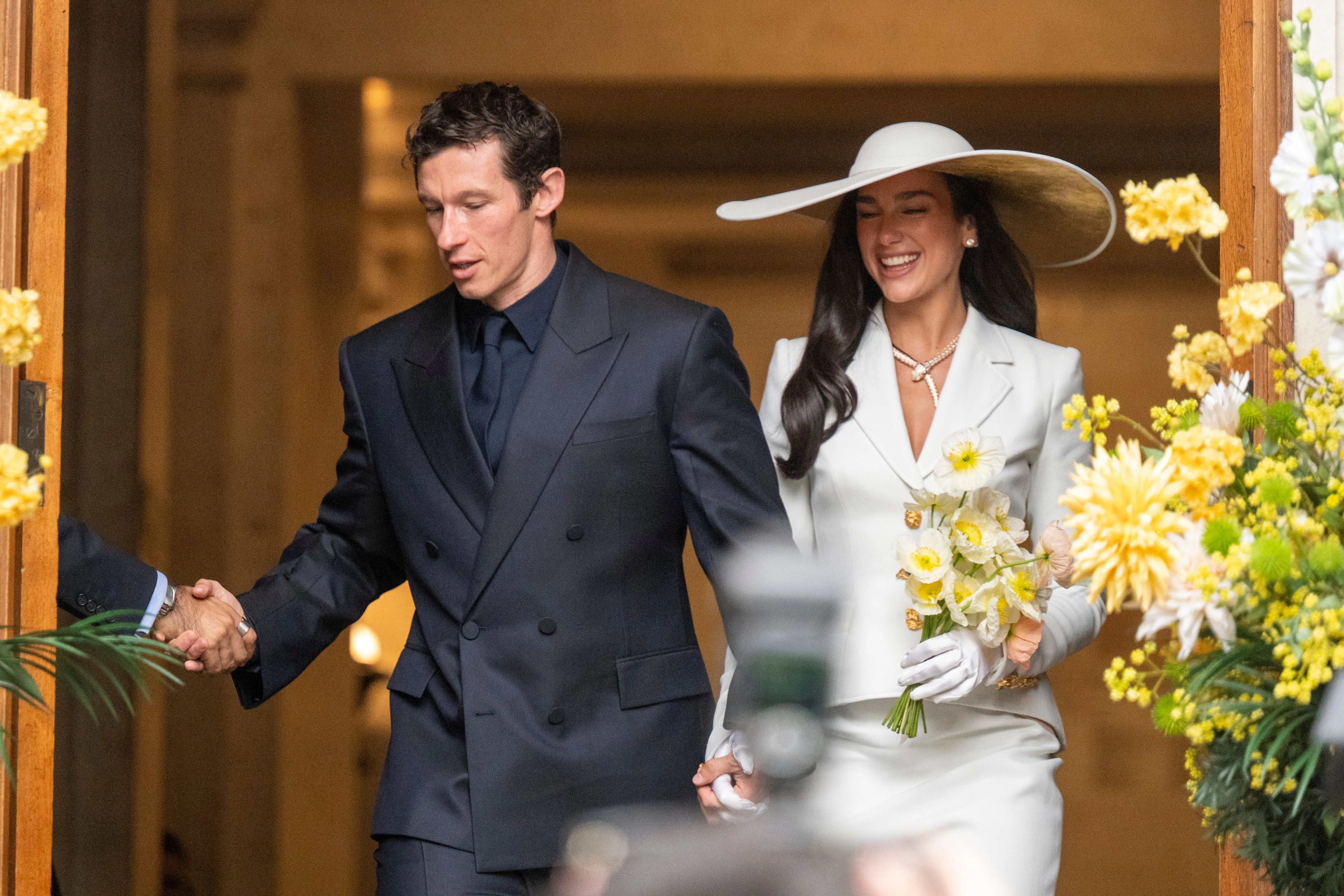 Dua Lipa wedding looks