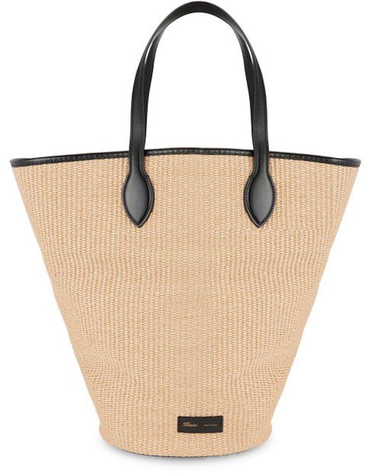 Medium bag | Leather handles | Visible stitching | Braided design | Label with logo on the front | S...