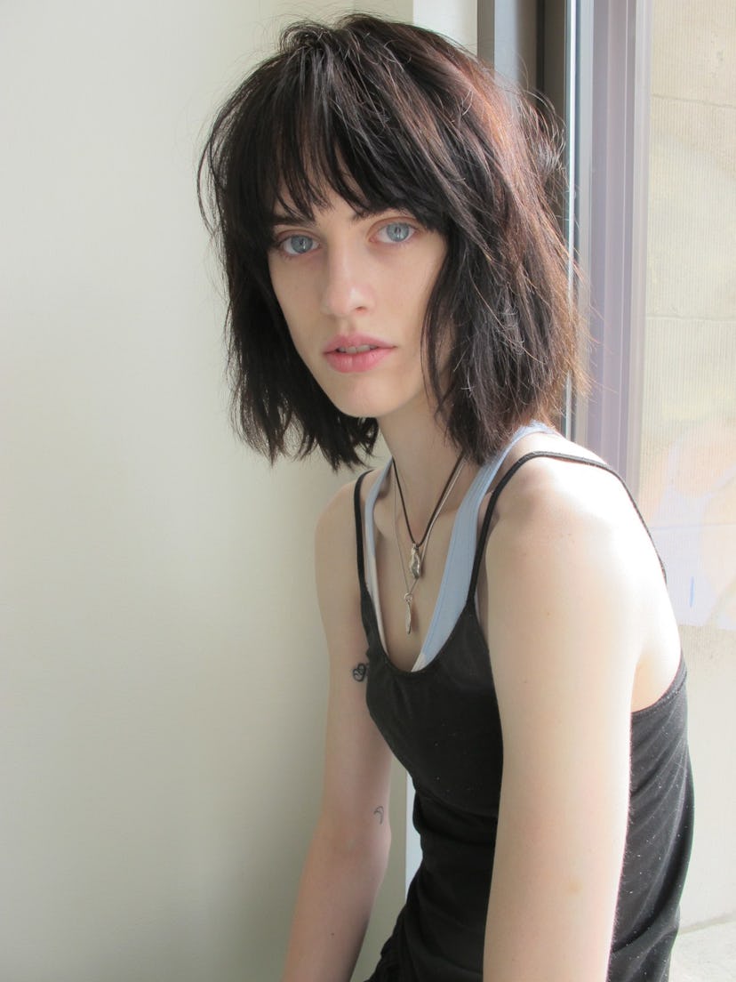 Sarah Brannon posing in a black sleeveless shirt