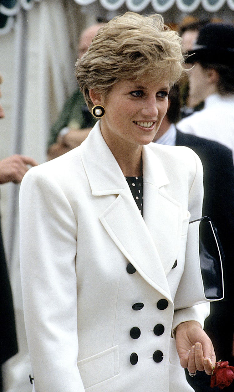 Princess Diana wearing a white blazer with padded shoulders