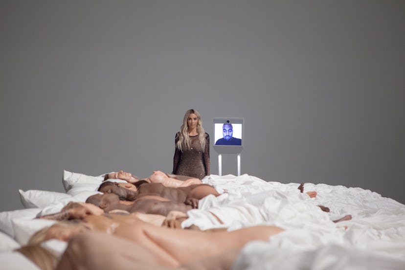 Kim Kardashian posing in front of Kanye West's "Famous" sculpture at the Blum & Poe Gallery in Los A...