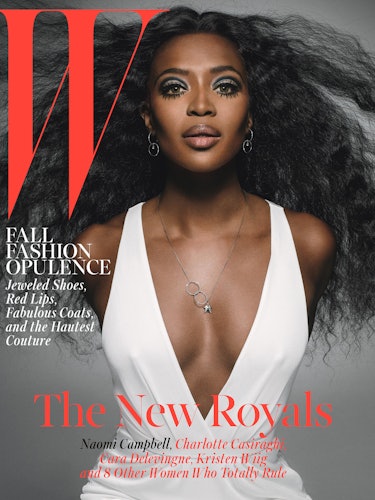 Naomi Campbell in a white V-neck dress on the cover of Q Magazine in 2014