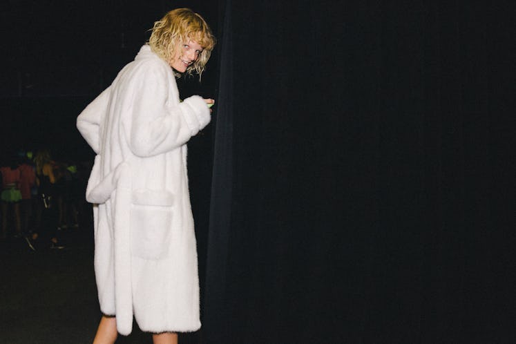 A model in a white Alexander Wang Spring 2017 teddy coat 