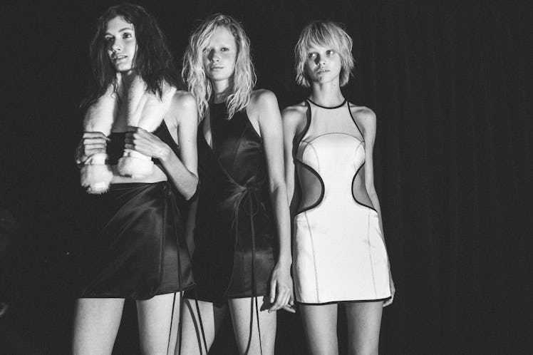 Models posing for a photo backstage at Alexander Wang Spring 2017