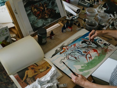 Cecily Brown painting her art at her art in her New York studio