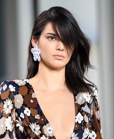 Kendall Jenner, with a natural look on the runway of the Michael Kors Spring 2017 show.