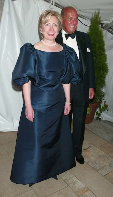 Hillary Clinton in a navy satin gown and a pearl necklace and earrings in November 2000