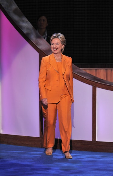 Hillary Clinton in an orange suit and top in August 2008