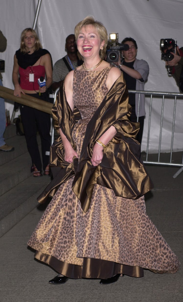 Hillary Clinton in a satin leopard print gown and cape in April 2001