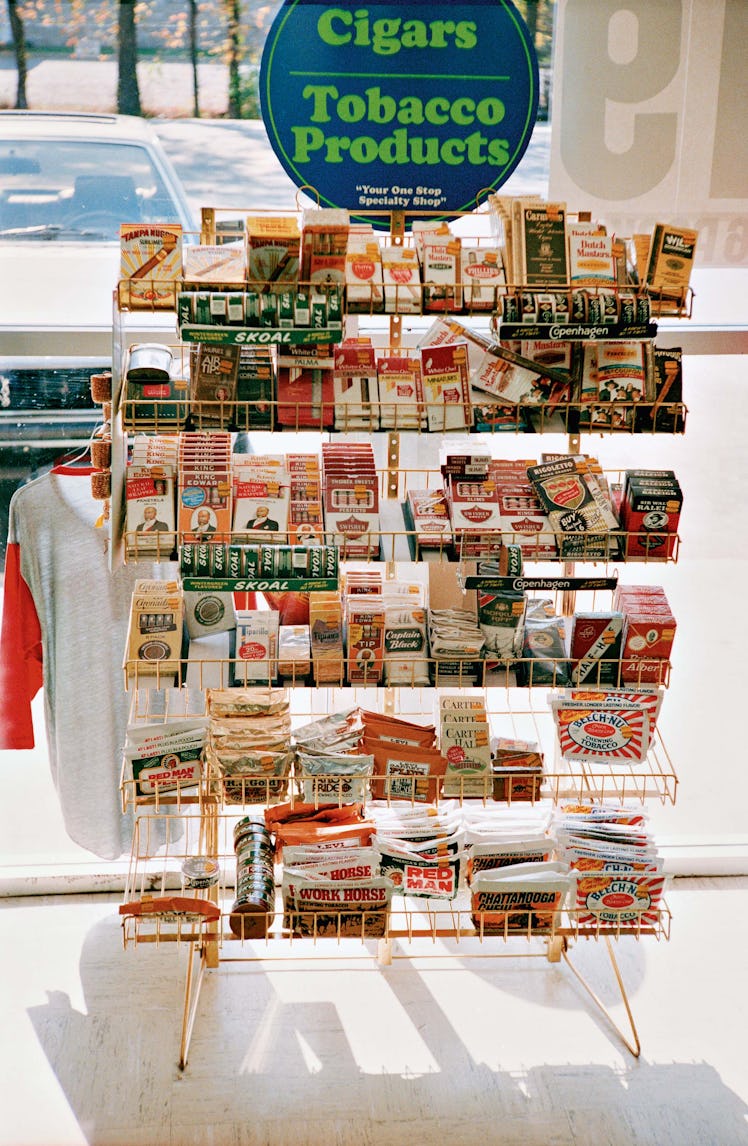 A shop shelf with tobacco products