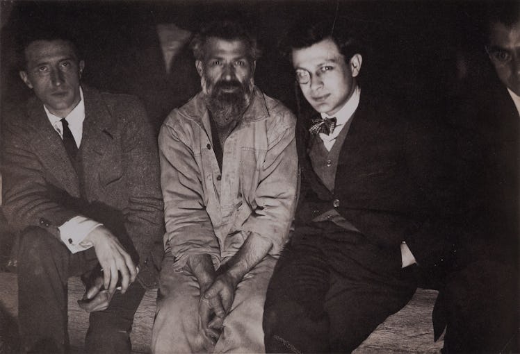 Duchamp, Brancusi, and Tristan Tzara sitting next to each other