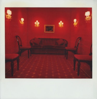 Happy Massee’s Polaroid of a red room from his book 'Diary of a Set Designer'