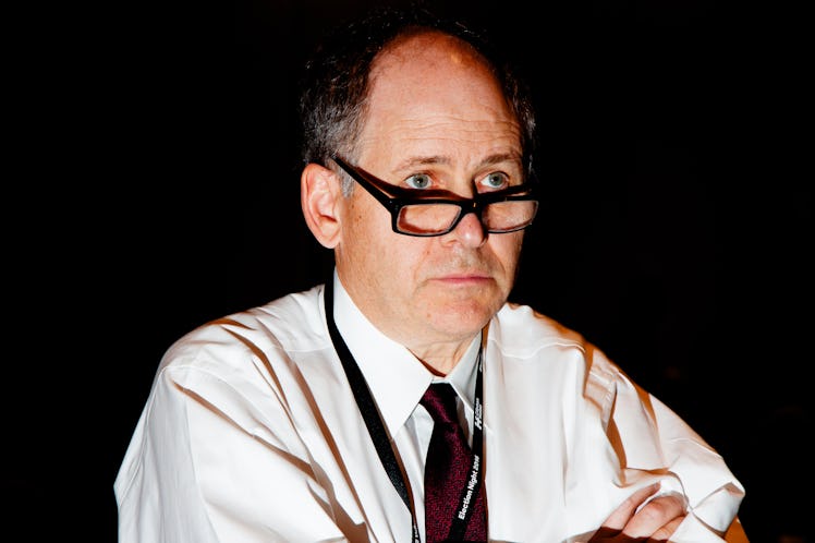 Jonathan Atler in a white button-up and tie with his glasses down at Hillary Clinton's election nigh...