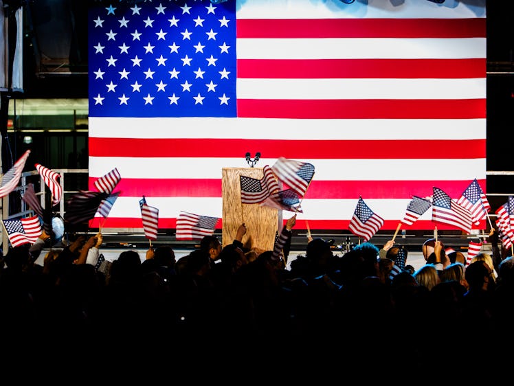 The stage during Hillary Clinton's election night rally with the U.S. flag in the background and the...