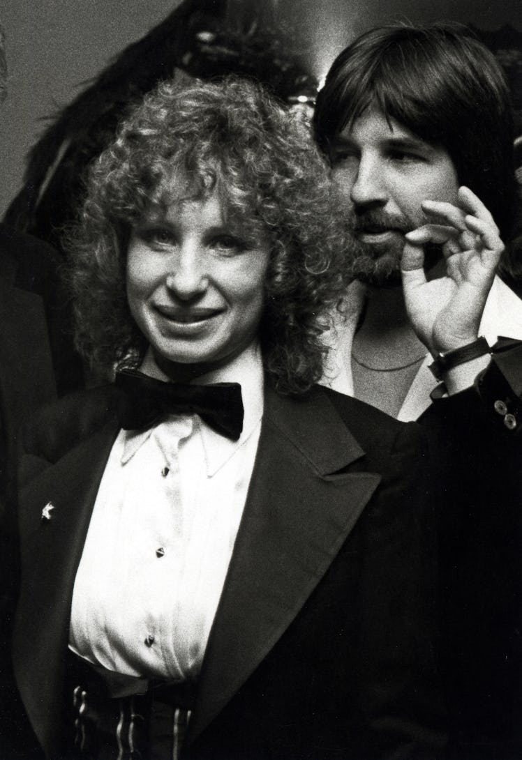 Barbra Streisand in a black tuxedo, black bowtie and a white shirt in 1976