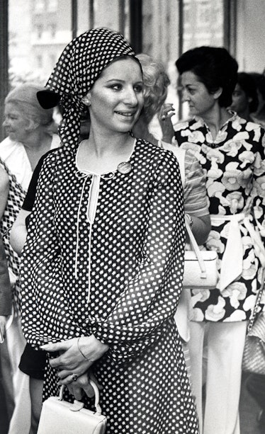 Barbra Streisand in a polka dot blouse and matching headpiece in 1970 