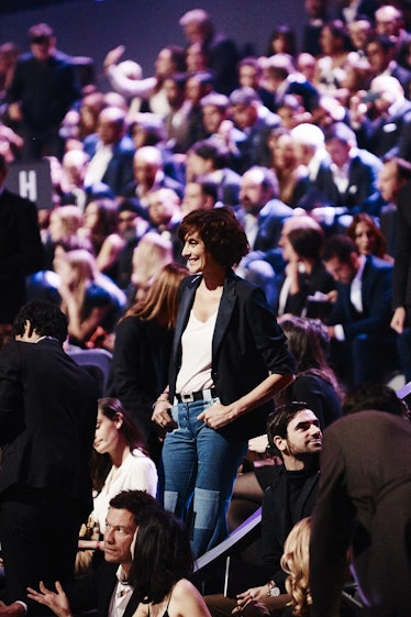 Emmanuelle Alt in a white top, black blazer and blue denim jeans at the Victoria's Secret Fashion Sh...