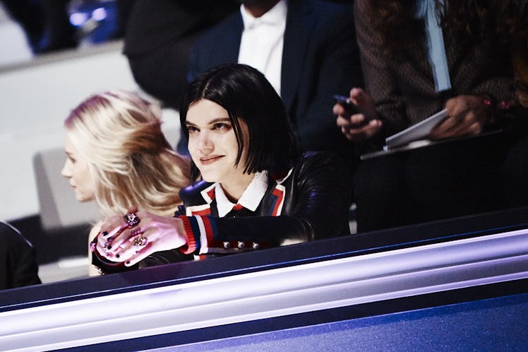 A blonde and a brunette woman sitting in the front row at the 2016 Victoria’s Secret Fashion Show