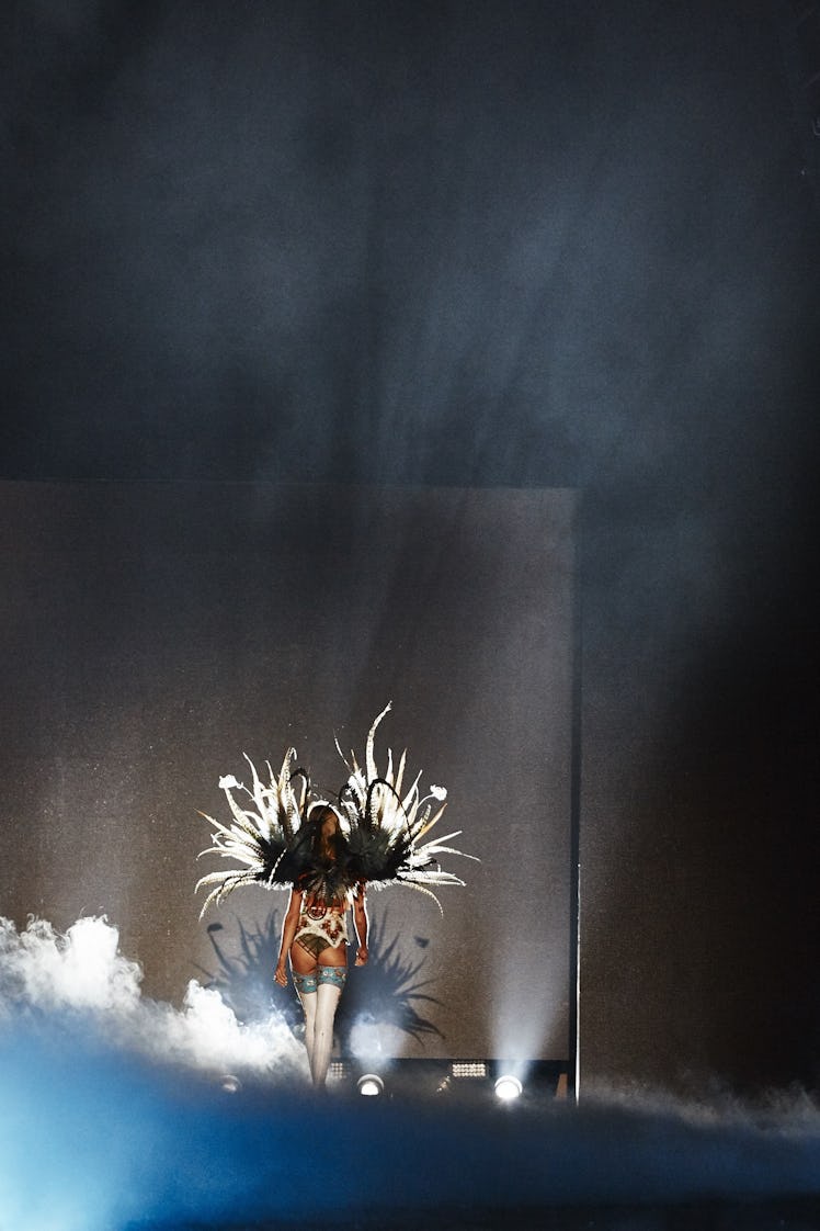 A model walking on the runway with large wings at the 2016 Victoria’s Secret Fashion Show 