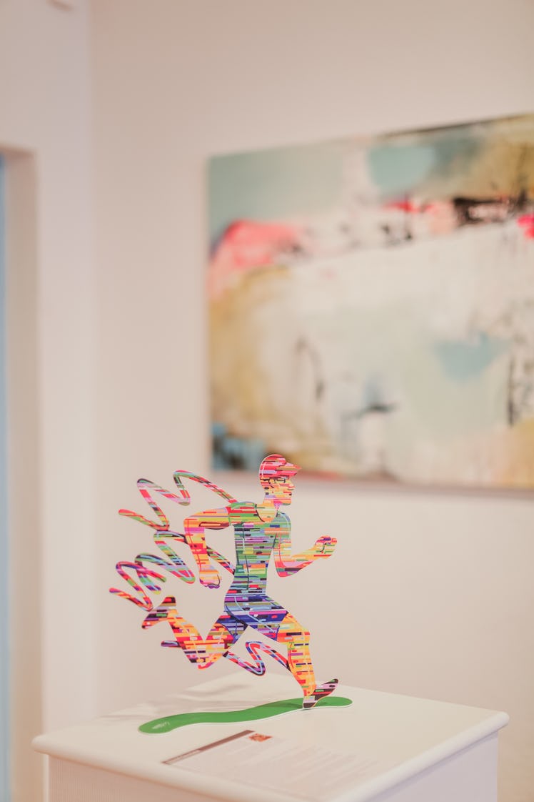 A sculpture of a running man as a part of the display at Art Basel Miami Beach 2016.