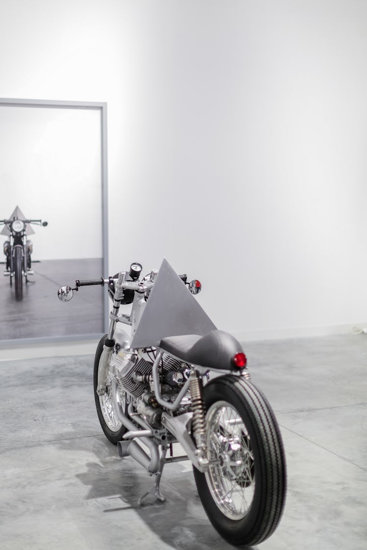 An installation with motorcycle displayed at Art Basel Miami Beach 2016.