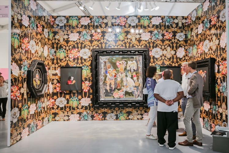 People appreciating artworks during Art Basel Miami Beach 2016.