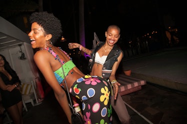 Guests having fun at the Moschino party at the Delano Hotel during Art Basel Miami Beach
