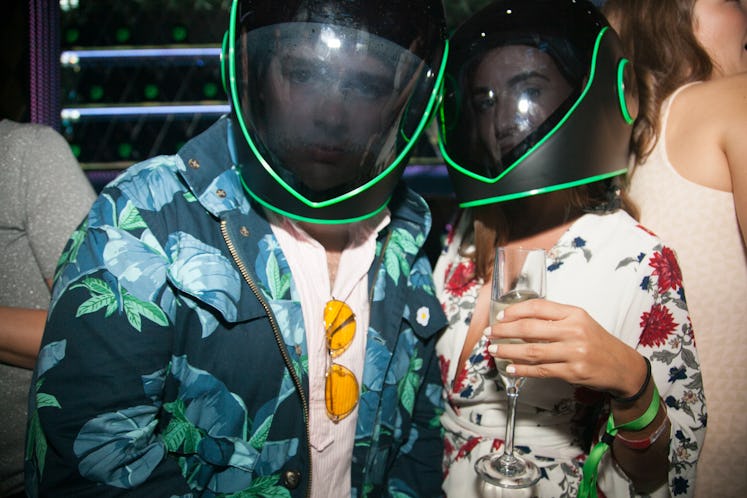 Guest wearing helmets at party during Art Basel Miami Beach