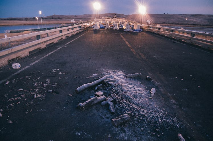Ashes on the road at Standing Rock
