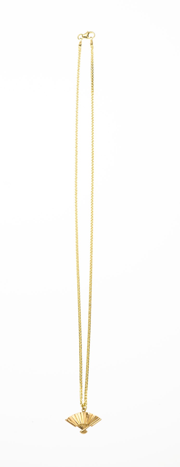 The Row golden necklace with a hand fan-shaped pendant.