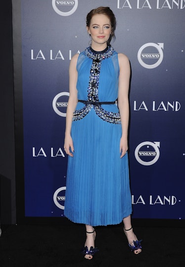 Emma Stone wearing a blue gown at a 2016 screening of La La Land