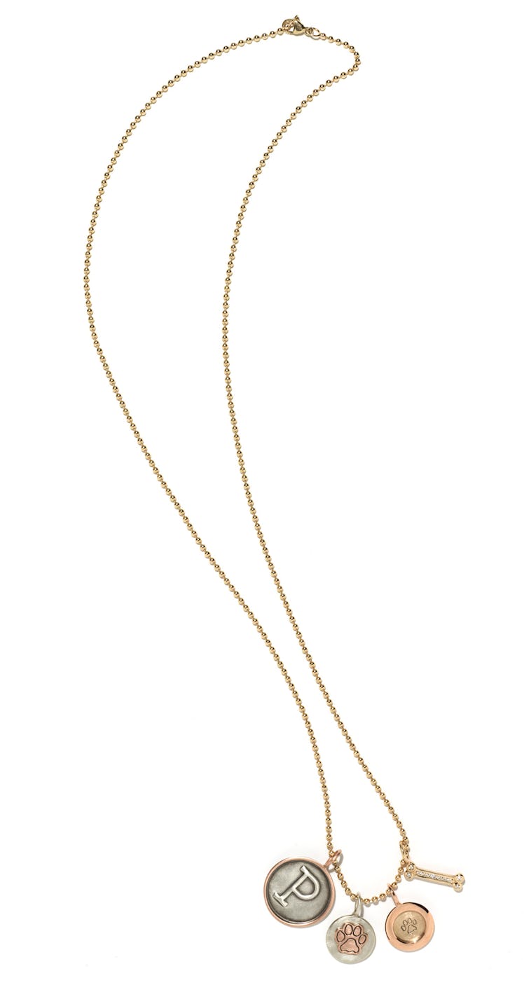 Heather Moore Jewelry gold, sterling silver, and diamond charm necklace, $5,495, heathermoorejewelry...