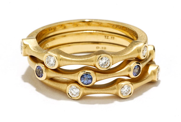 Carelle gold and diamond rings, $1,140 each, and (middle) gold and tanzanite ring, $775, carelle.com...