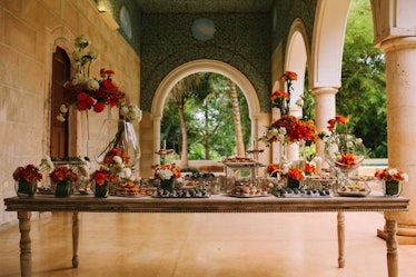 The dessert table was so much fun—and the hand-painted ceiling in the corridor next to the garden wa...