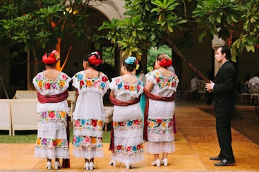 The ushers wore traditional Yucatan dress.