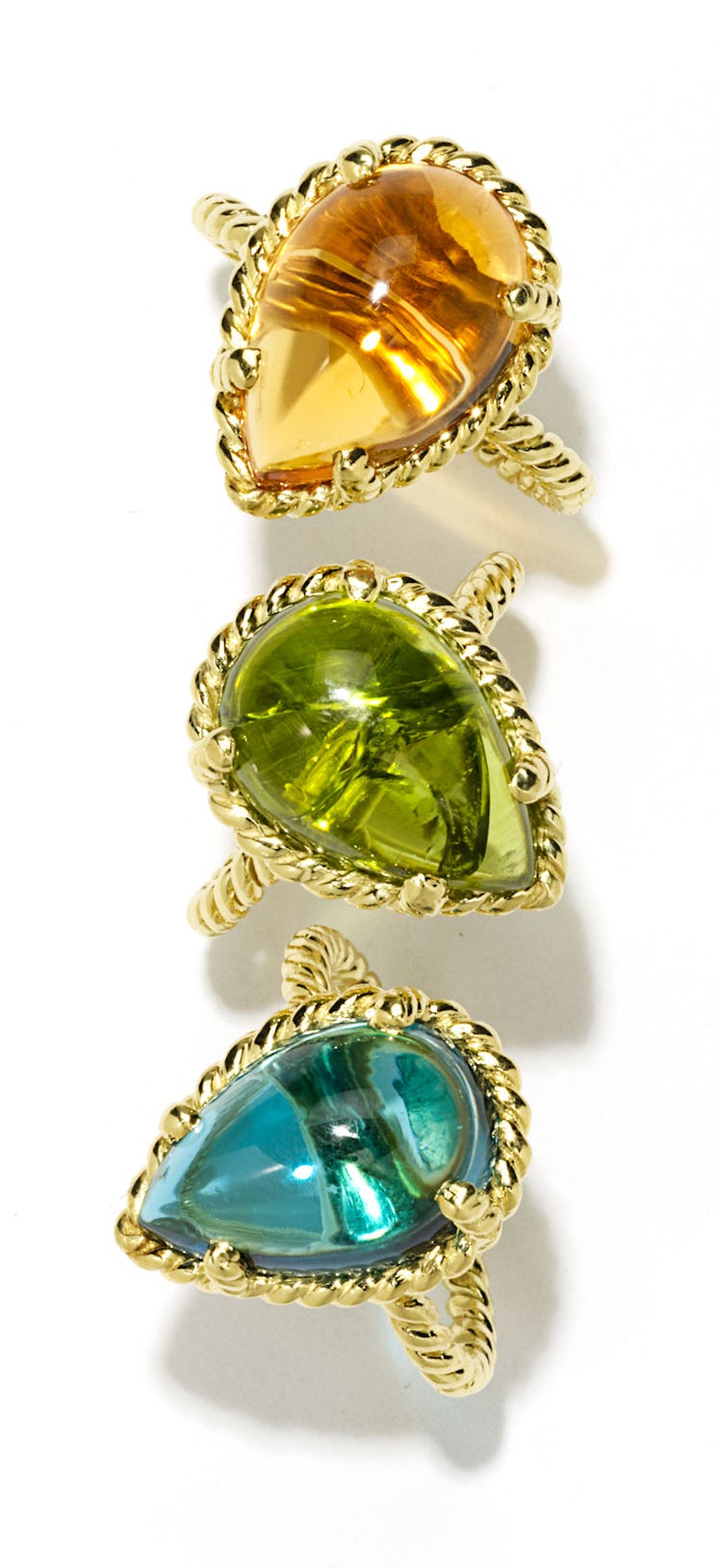 Cassis (from top) gold and citrine ring, $1,620, gold and peridot ring, $5,095, and gold and topaz r...