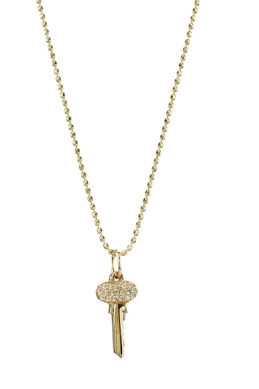 __For the mini-jewelry lover:__ Sydney Evan 14k gold and pave diamond mini key necklace, $550, [berg...