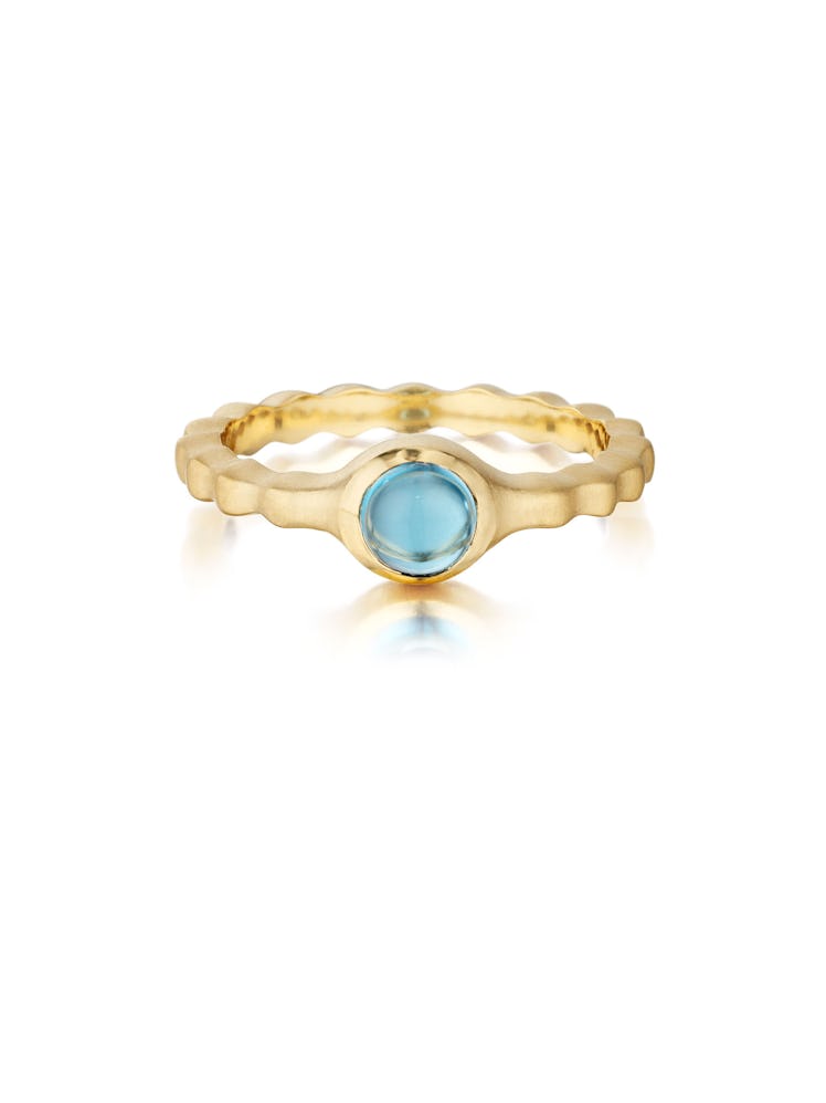 __For the collector:__ Carelle18k yellow gold, blue topaz Pebbles Stack Ring, $875, [carelle.com](ht...